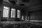 Abandoned assembly hall at the School, house of art. The concept of destruction and decline of culture and art. black and white