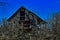 Abandoned Barn through the brush at Weldon Springs State Park and Natural Area