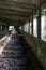 Abandoned barn. Old room with windows. Vertical photo.