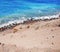 Abandoned beach with crystal clear azure sea in Greece