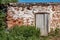 Abandoned brick cowshed