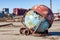 Abandoned and Broken Globe Amongst Waste: Symbol of Planet\\\'s Mistreatment and Pollution