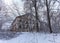 Abandoned and broken old two-storey brick house in the forest