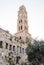 Abandoned building of caravanserai Khan al-Umdan and the clock t