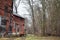 Abandoned Building with Orange Siding