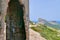 Abandoned building at Talaia d'Albercutx watchtower, Cap de Formentor in the background. Majorca, Spain.