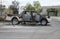 Abandoned burned truck with open doors. Car caught on fire