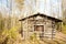 Abandoned cabin in the fall