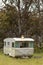 Abandoned caravan left in a field