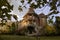 Abandoned castle in the country side during Autumn