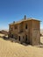 Abandoned city of Kolmanskop in Namibia. Ancient city, sand in desert of Africa.