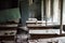 Abandoned class room with dust and debris in school of Pripyat