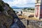 Abandoned clock tower in old fortress in Corfu with panoramic view of Corfu town, Greece