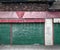 Abandoned closed shop with decaying facade