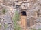 Abandoned and collapsed limestone adit in canyon mine