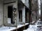 Abandoned collapsing multi-storey building. Inscription love and heart symbol on a wall. The gloom, sadness, loneliness.