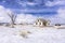 Abandoned colorado homestead in winter with snow