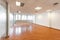 Abandoned commercial premises for sale in a huge shopping complex. Large, airy, empty and well lit room with three