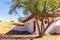 Abandoned courtyard and house buried in sand in Al Madam ghost village in Sharjah, United Arab Emirates