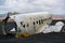 Abandoned Crashed Airplane on Black Sand Beach