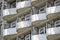 Abandoned crumbling building with semicircular balconies - danger of collapse