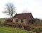 Abandoned and decayed farm house waiting demolishment at the Gouwe Park in Moordrecht, the netherlands.