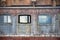 Abandoned distinctive dormer windows in close up