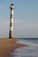 Abandoned falling lighthouse on the beach of Saaremaa island