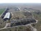 Abandoned farm, aerial view. Dilapidated industrial buildings