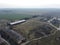 Abandoned farm, aerial view. Dilapidated industrial buildings