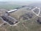 Abandoned farm, aerial view. Dilapidated industrial buildings