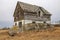 Abandoned farm house on prairie