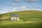 Abandoned Farmhouse in a Wheat Field.