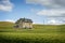 Abandoned Farmhouse in a Wheat Field.