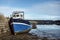 Abandoned Fishing Boat at Dock at Low Tide