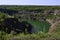 Abandoned flooded granite mine