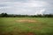 Abandoned football field with nobody and very bad grass