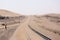 Abandoned and forgotten railway being taken over by encroaching sandstorm, Kolmanskop ghost town, Namib Desert. Africa