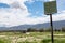 Abandoned golf driving range course in Borrego Springs, California. Only a rusty sign remains