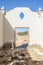 Abandoned graveyard with crumbling stones and crosses in Namib Desert of Angola