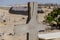 Abandoned graveyard with crumbling stones and crosses in Namib Desert of Angola