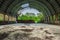 Abandoned hangar in forest