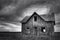 Abandoned Haunted Farm House with Stormy sky