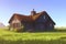 Abandoned house in countryside. Desolate residential building in nature.