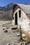 Abandoned housing detail in the andes mountain range as background