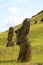 Abandoned huge Moai statues on the slope of Rano Raraku volcano, legendary Moai quarry on Easter Island, Chile