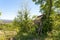 Abandoned hunting shack. Spring landscape