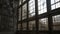 An abandoned industrial building with broken windows Hype one created with generative AI