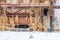 abandoned industrial building, close-up of a rusty metal structure with icicles