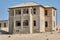 Abandoned Kolmanskop building in Namibian Desert